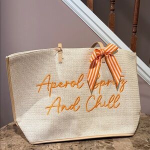 Seafarer Shores Tote/Beach Bag Embroidered “Aperol Spritz And Chill” on Raffia